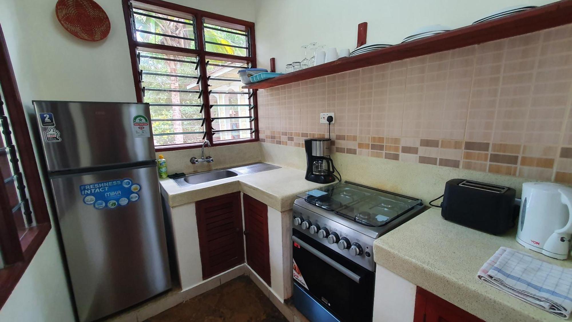 Safina Cottages Diani Beach Exterior foto